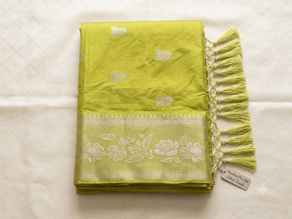 Woven Silk Saree with Elegant Zari Border & Floral Motifs